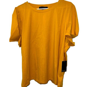 Nwt Striking Goldenrod, puff sleeved T by Eloqull. Beautiful in its simplicity